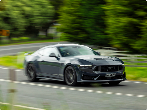 Ford Mustang Dark Horse in motion