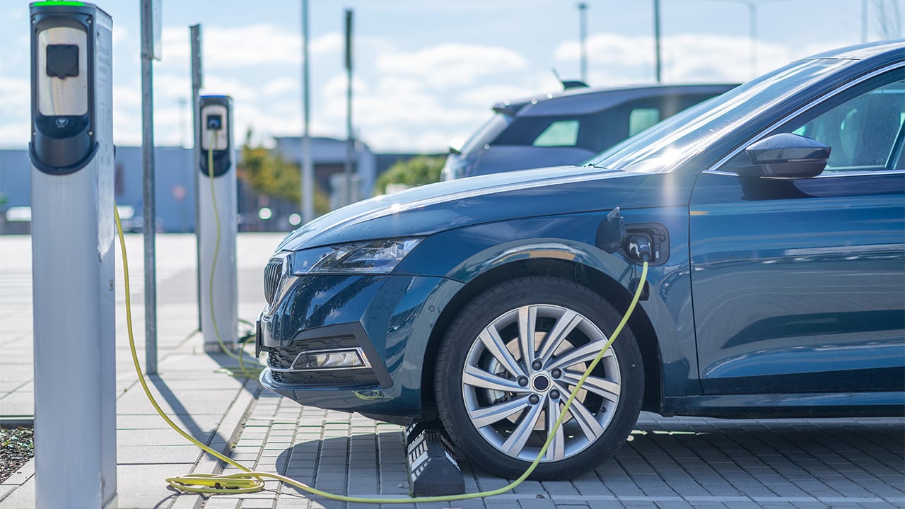 an electric car plugged into a charging station