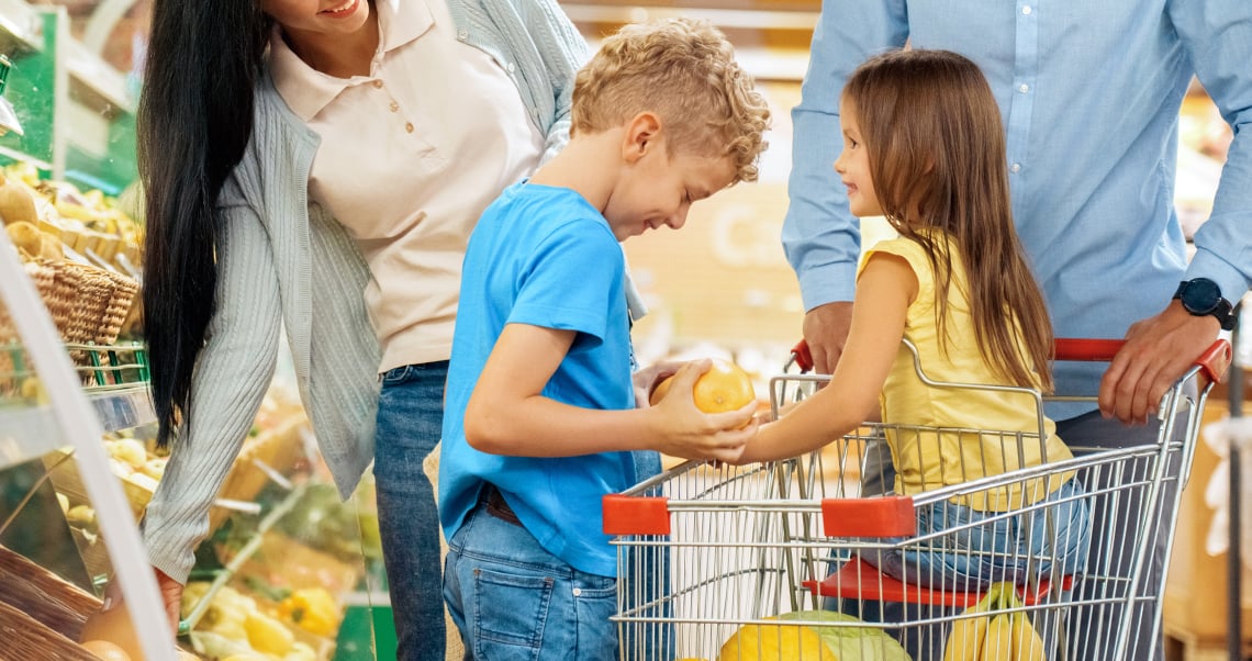 Family shopping in supermarket